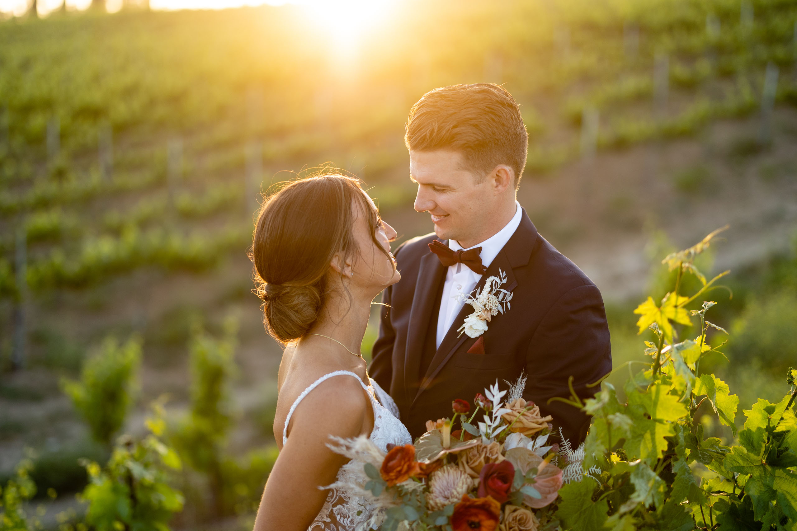 bride and groom in the vineyard